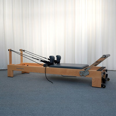 Qualità Prezzo di fabbrica Reformer Pilates Eco-Friendly Resistente In Legno di Fico Pilates Studio Fabbrica