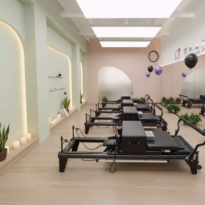 Calidad Cama de máquina de pilates de aluminio suave Reformador Uso comercial para el culturismo Fábrica