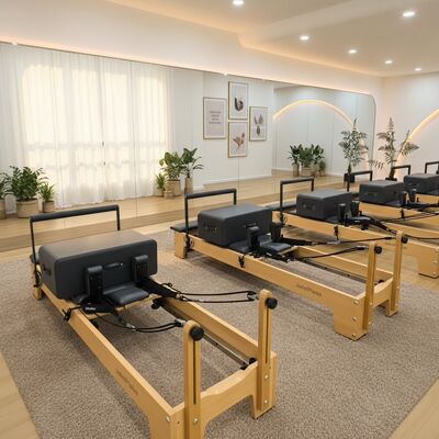 Quality Commercial Pilates Reformer Maple Wood Reformer Bed Portable Body Training Equipment factory