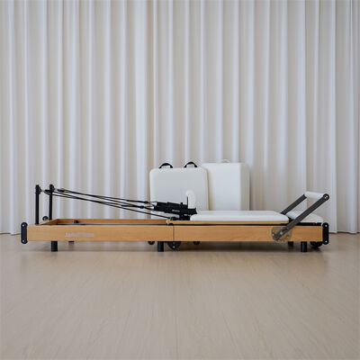 Kwaliteit Op maat gemaakte professionele studio-pilatesapparatuur van hoge kwaliteit, houten hervormer, opvouwbare draagbare pilates-hervormer. Fabriek