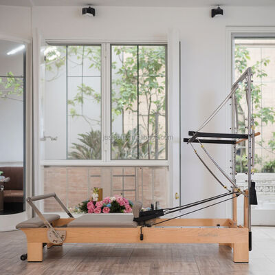 Qualità Legno d'acero pilates torre riformatrice con mezzo trapezio macchine esercizio legno di quercia Fabbrica