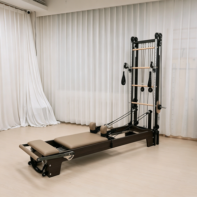 Calidad Reformador de Pilates de madera maciza al por mayor de fábrica con torre de medio trapecio en espiral Superficie de marco personalizado Logotipo de color de cuero Accesorios estándar completos Fábrica