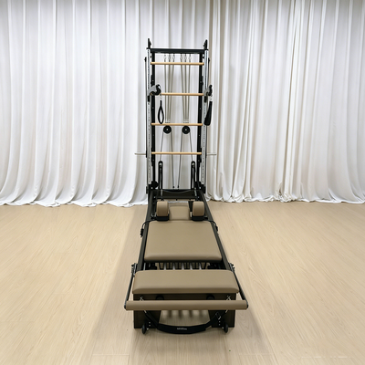 Kwaliteit Factory Direct Maple Wood Pilates-hervormer met spiraalvormige halve trapeze-toren Groothandel op maat gemaakte Pilates-trainingsapparatuur Fabriek