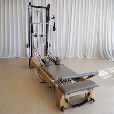 Qualité Lit de noyau de Pilates en bois d'érable direct d'usine avec demi-tour Machine de reformage de Pilates en bois massif Durable pour la formation de Pilates à domicile en studio de gymnastique Usine