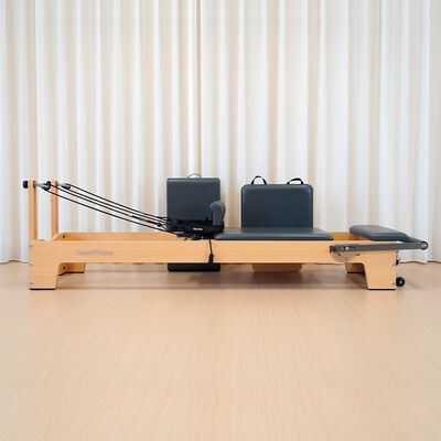 Qualität Holz Reformer Pilates-Maschine Ideal für Fitnessstudios und Heimtrainer, die Leistung und elegante Holzkonstruktion bieten Fabrik