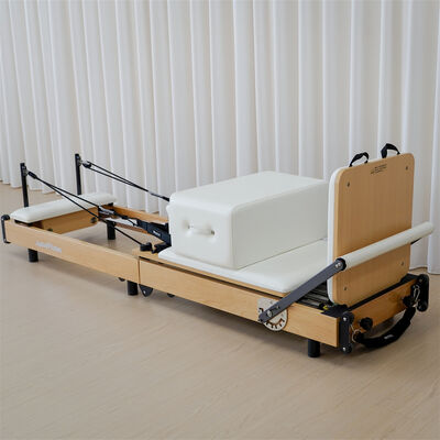 Qualité Économie d'espace Pilates pliable en bois réformateur portable pilates maison lit petit appartement machine d'entraînement yoga Usine