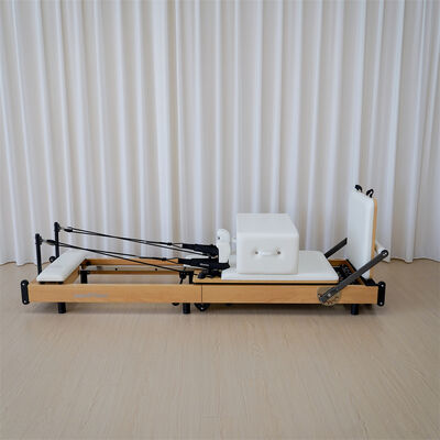 Qualidade Reformer de Pilates Dobrável em Madeira de Maple Easy Move para Casa com Rodas para Treinamento em Espaços Pequenos Fábrica