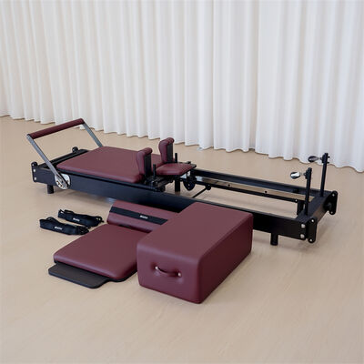 Qualité Pilates en bois pliable personnalisé Réformateur d'usine fourniture de pilates réglable Lit avec accessoires d'entraînement complets Usine