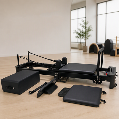Quality Professional Yoga Studio Use Foldable Portable Folding Aluminum Reformer Core Bed Body Training Convenience Pilates Reformers factory